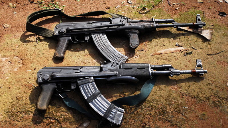 Two Ak-47 Rifles — Brown, Dramatic