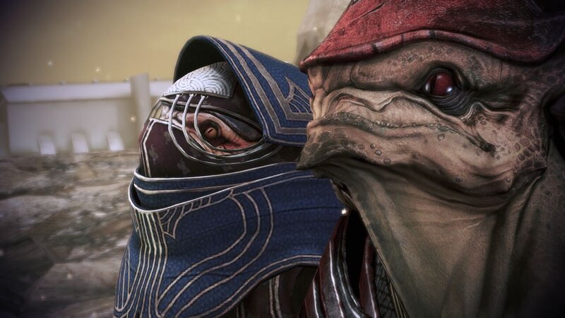 two alien characters in close-up