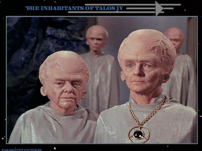 Two Alien Figures