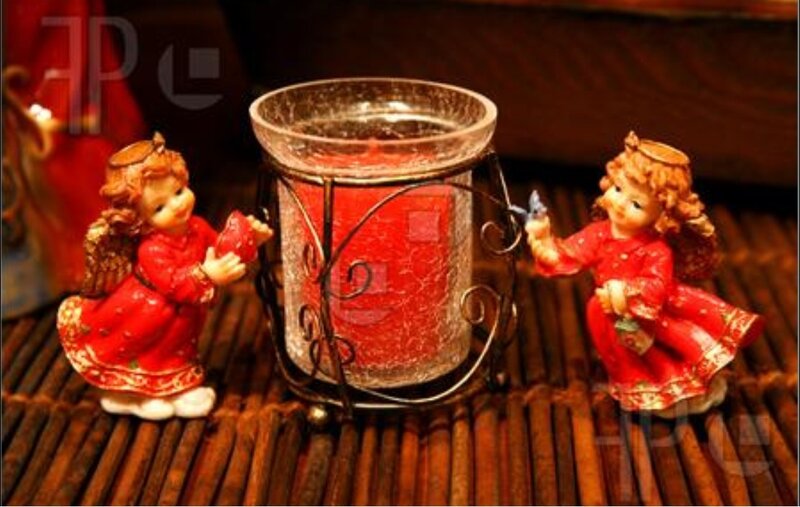 Two Angel Figurines with Candle