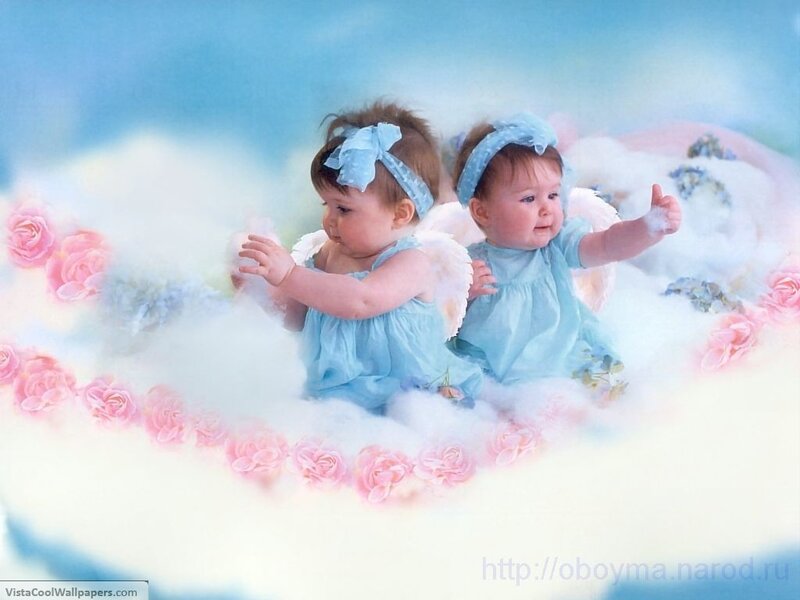 Two angelic babies on clouds