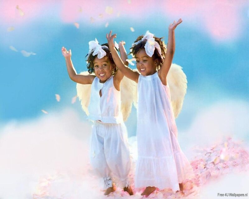 two angelic children in white