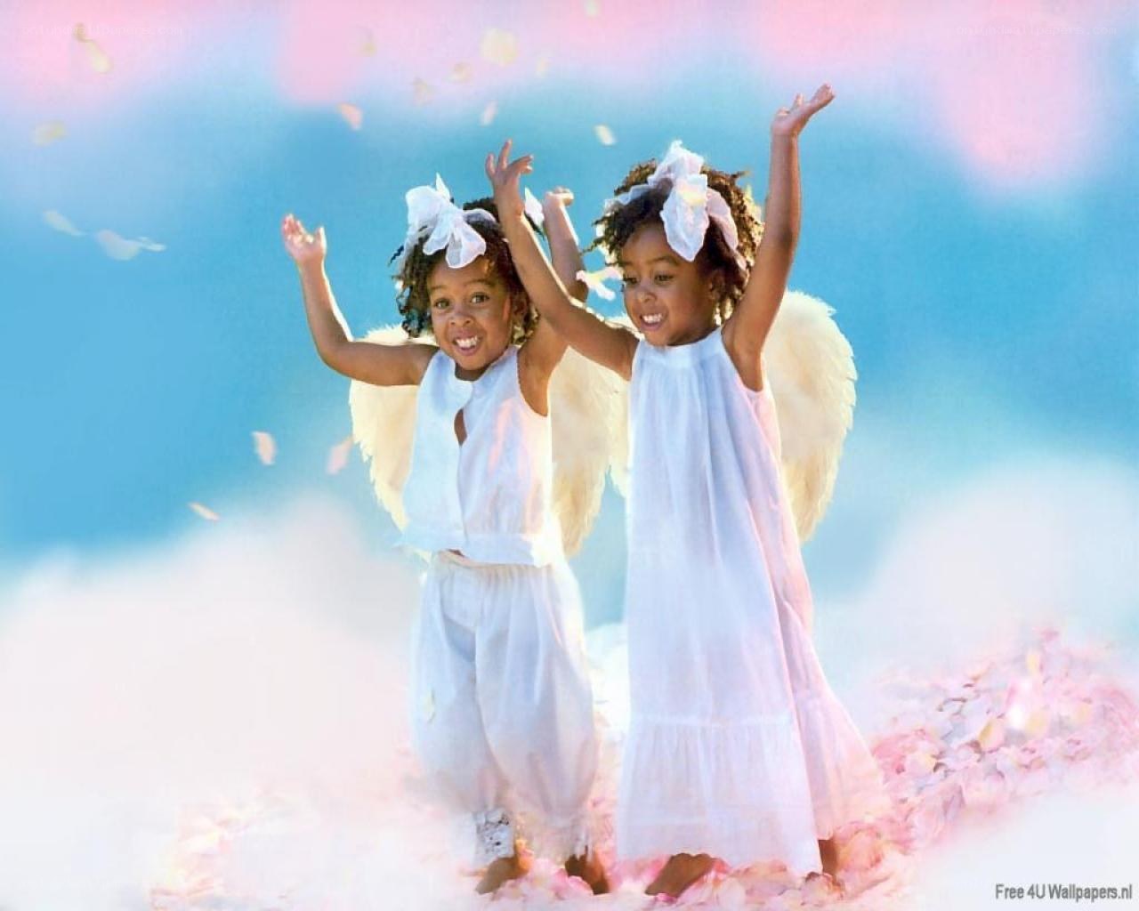 two angelic children in white