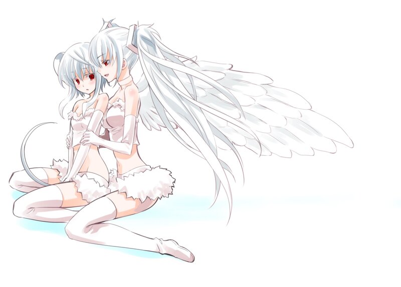two angelic figures sitting