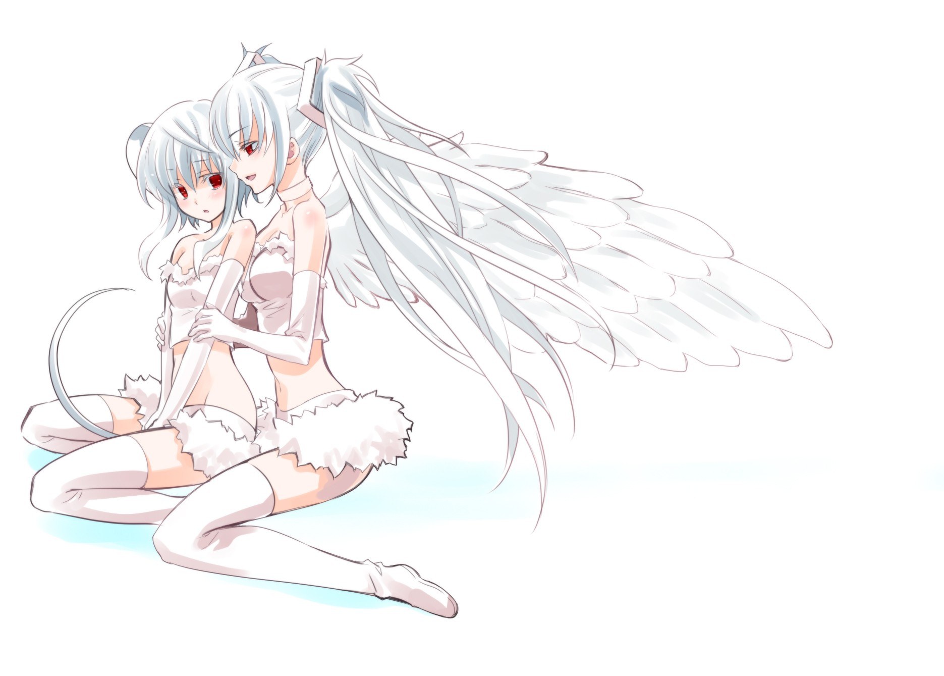 two angelic figures sitting