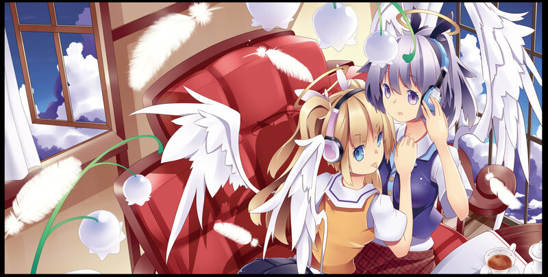 Two Angelic Girls on Couch