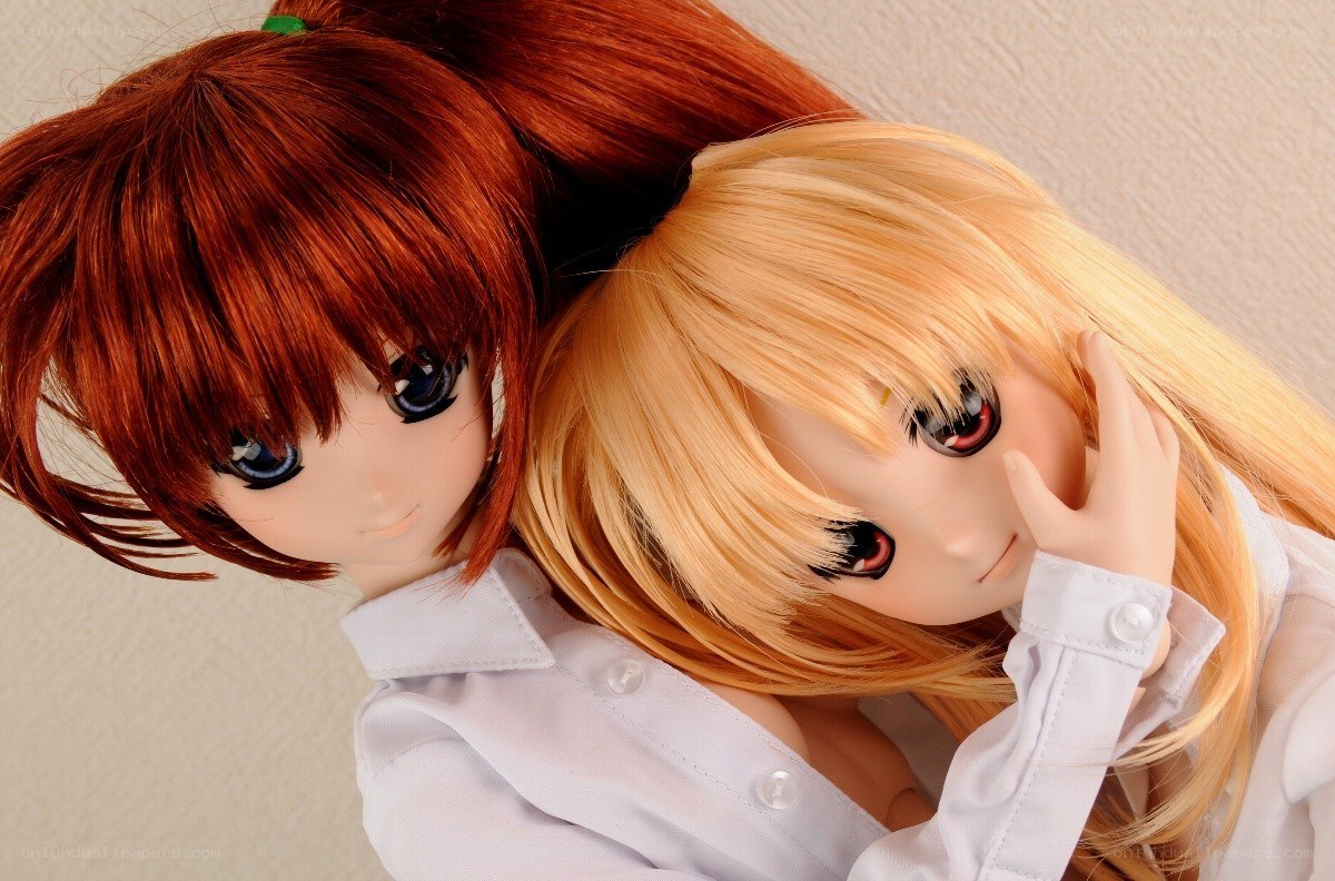 two anime dolls in white shirts