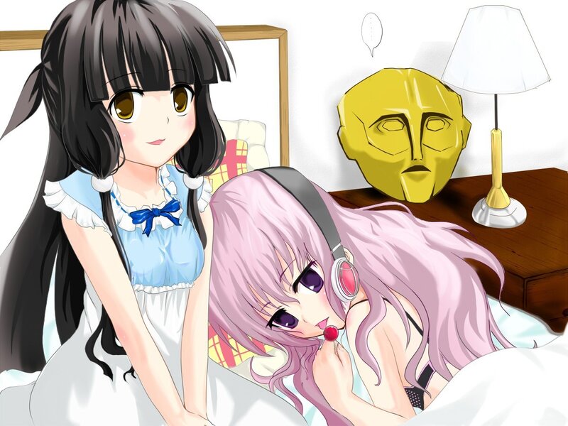 Two anime girls in a bedroom