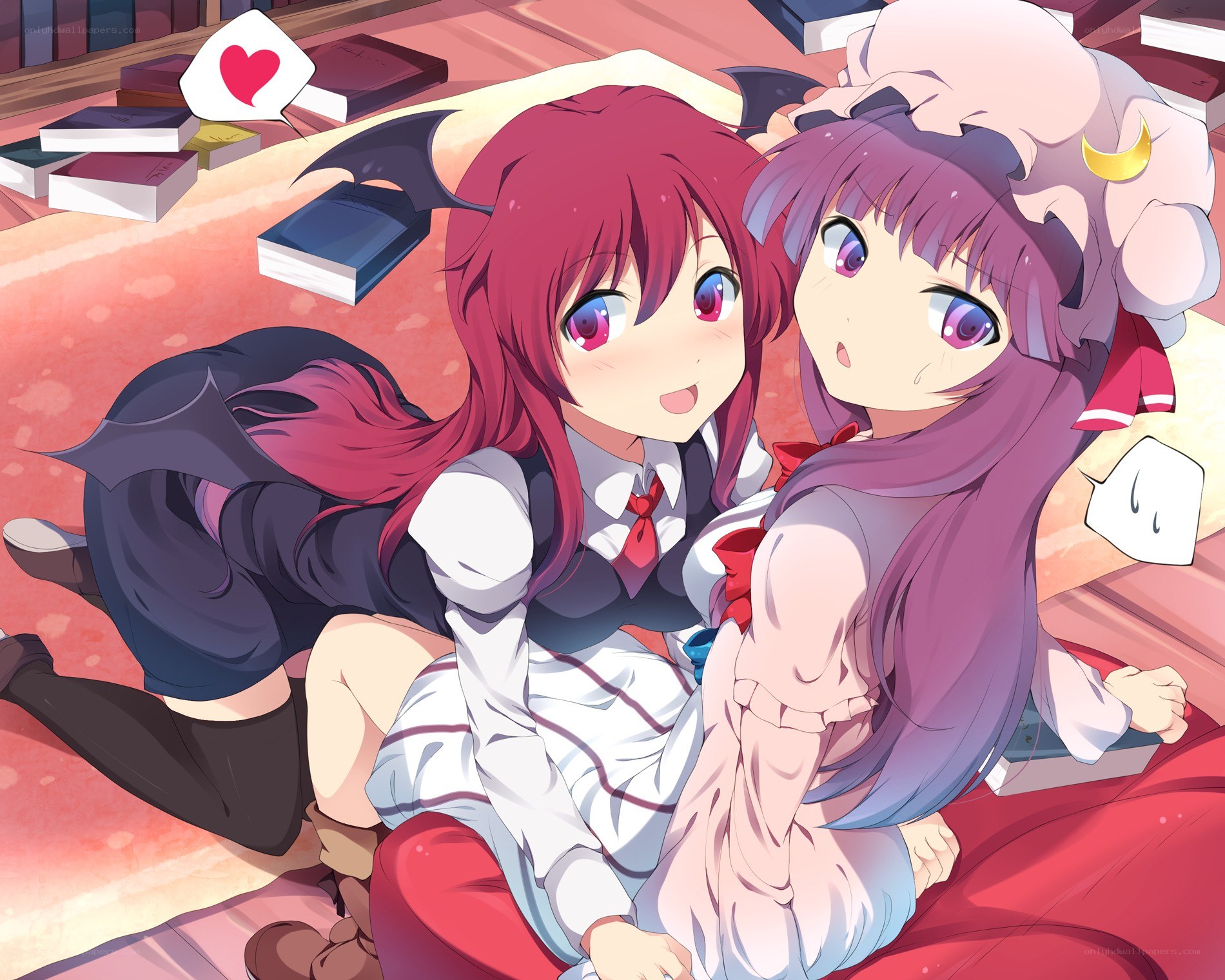 Two anime girls in a library