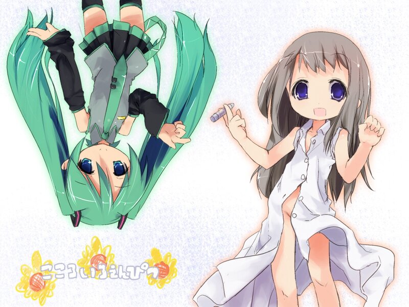 Two anime girls in a playful scene