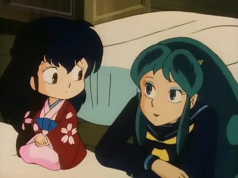 Two anime girls in a room