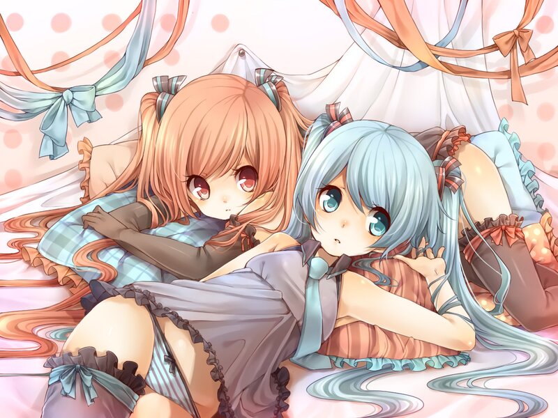 Two anime girls in bed