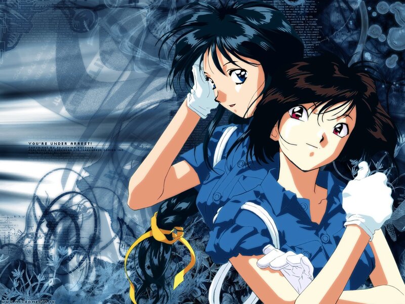 Two anime girls in blue uniforms