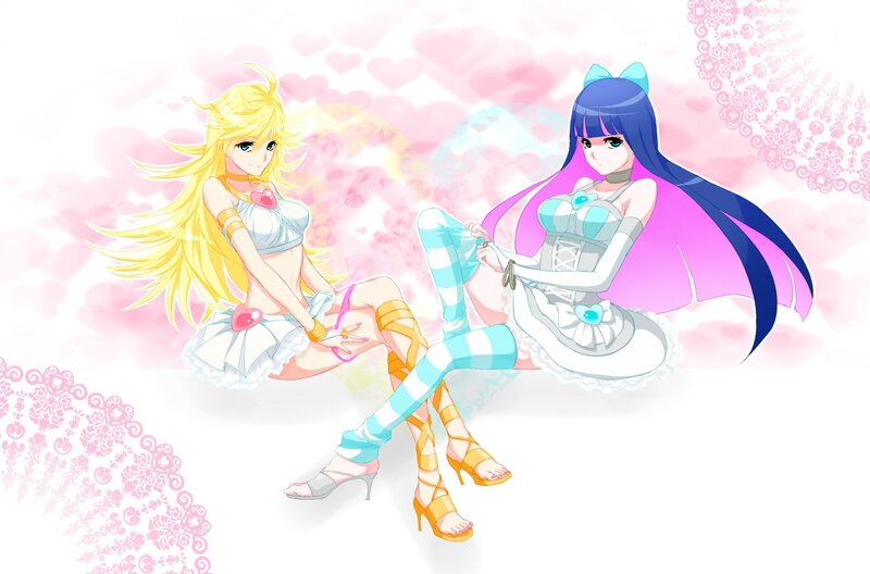 two anime girls in costumes