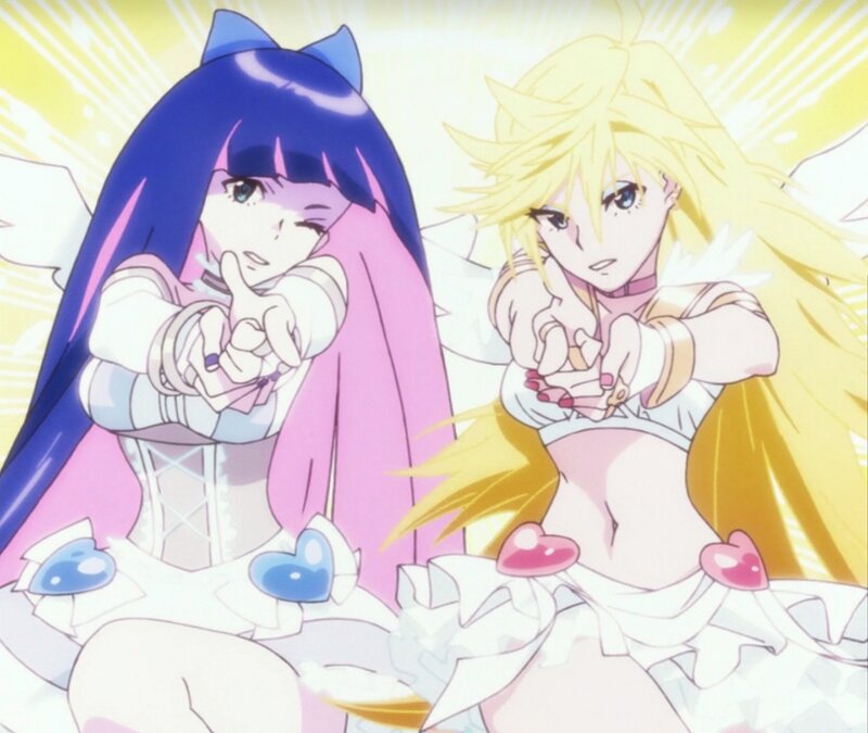 two anime girls in costumes