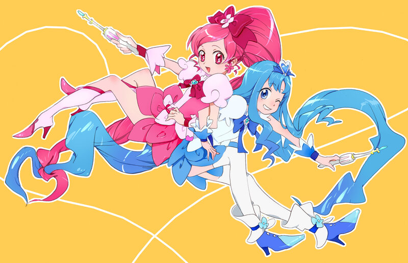 Two Anime Girls in Costumes — Yellow, Playful