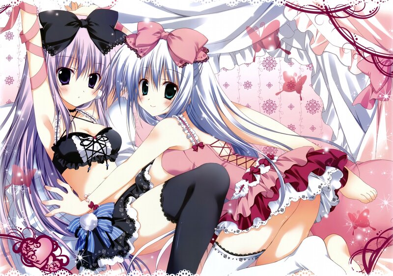Two anime girls in frilly outfits
