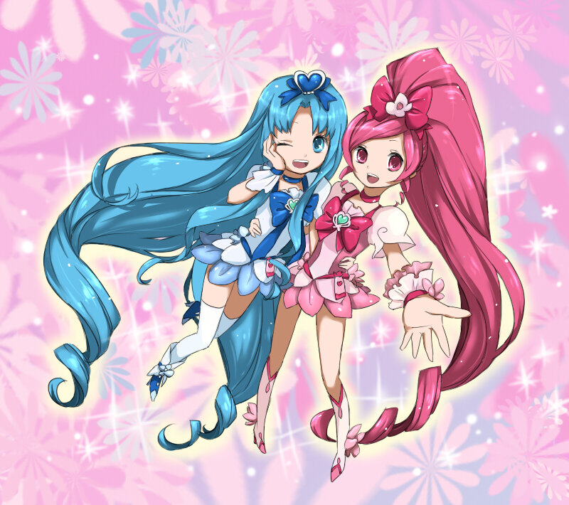 two anime girls in magical outfits