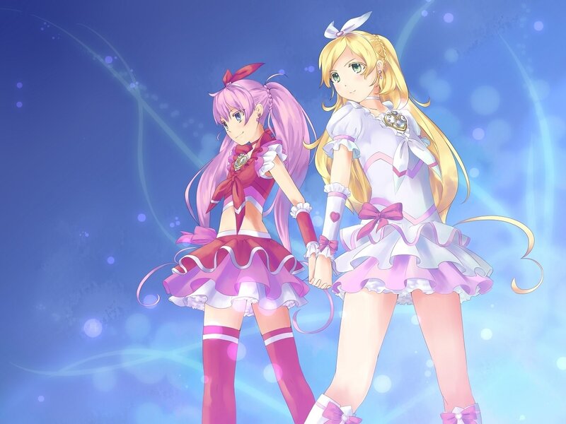 two anime girls in magical outfits