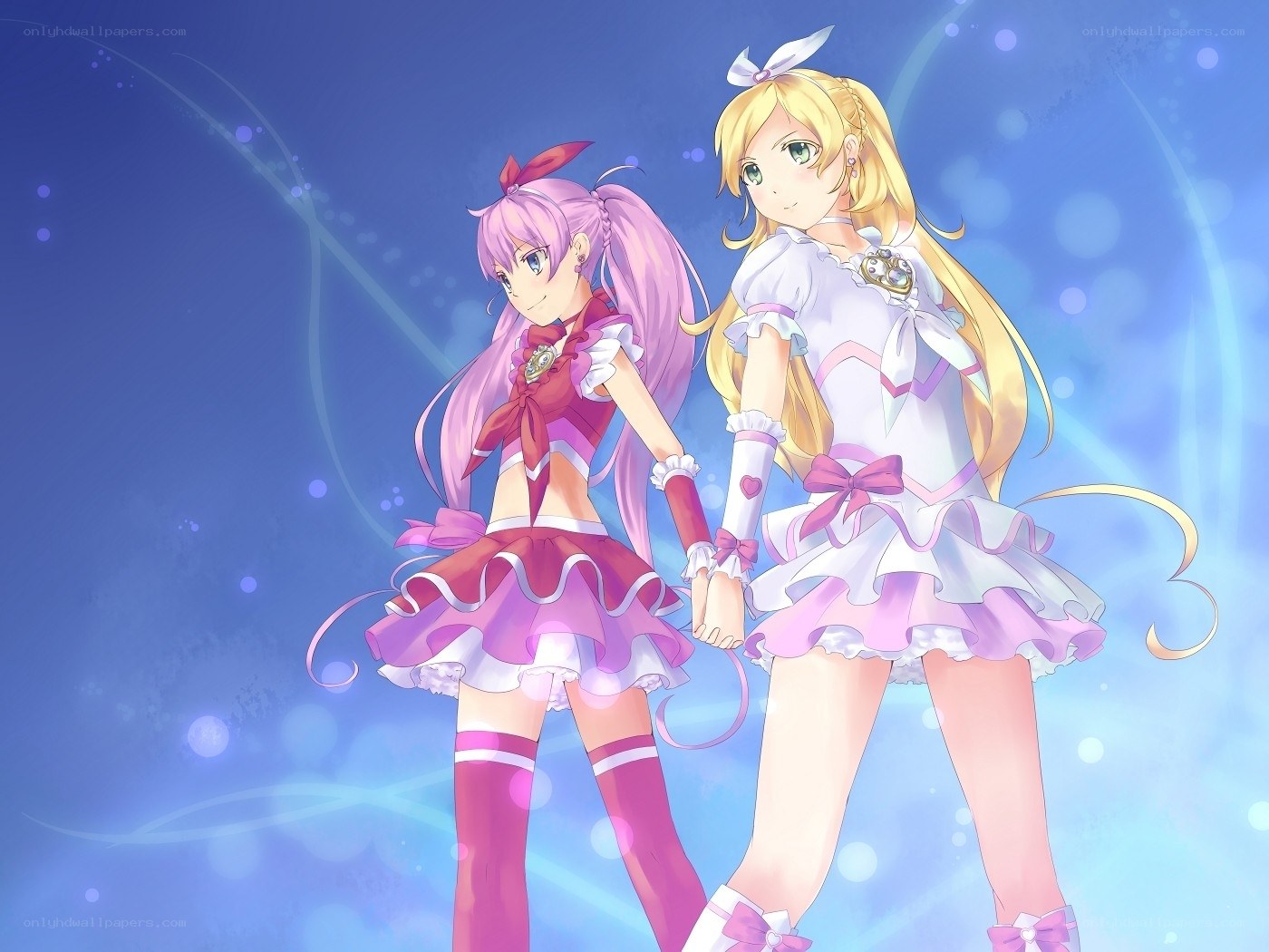 two anime girls in magical outfits