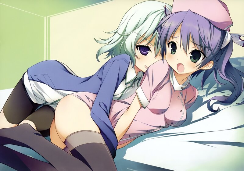 Two anime girls on a bed
