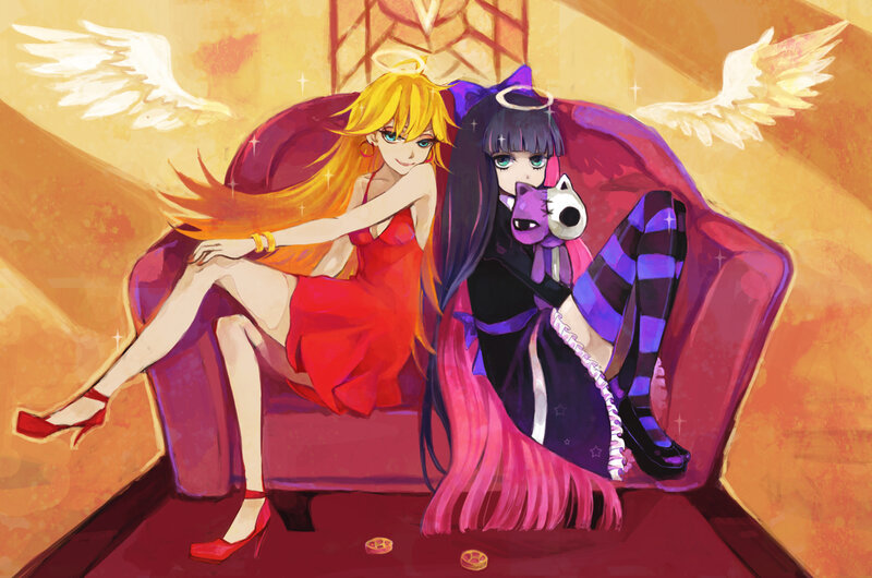 Two anime girls on a couch