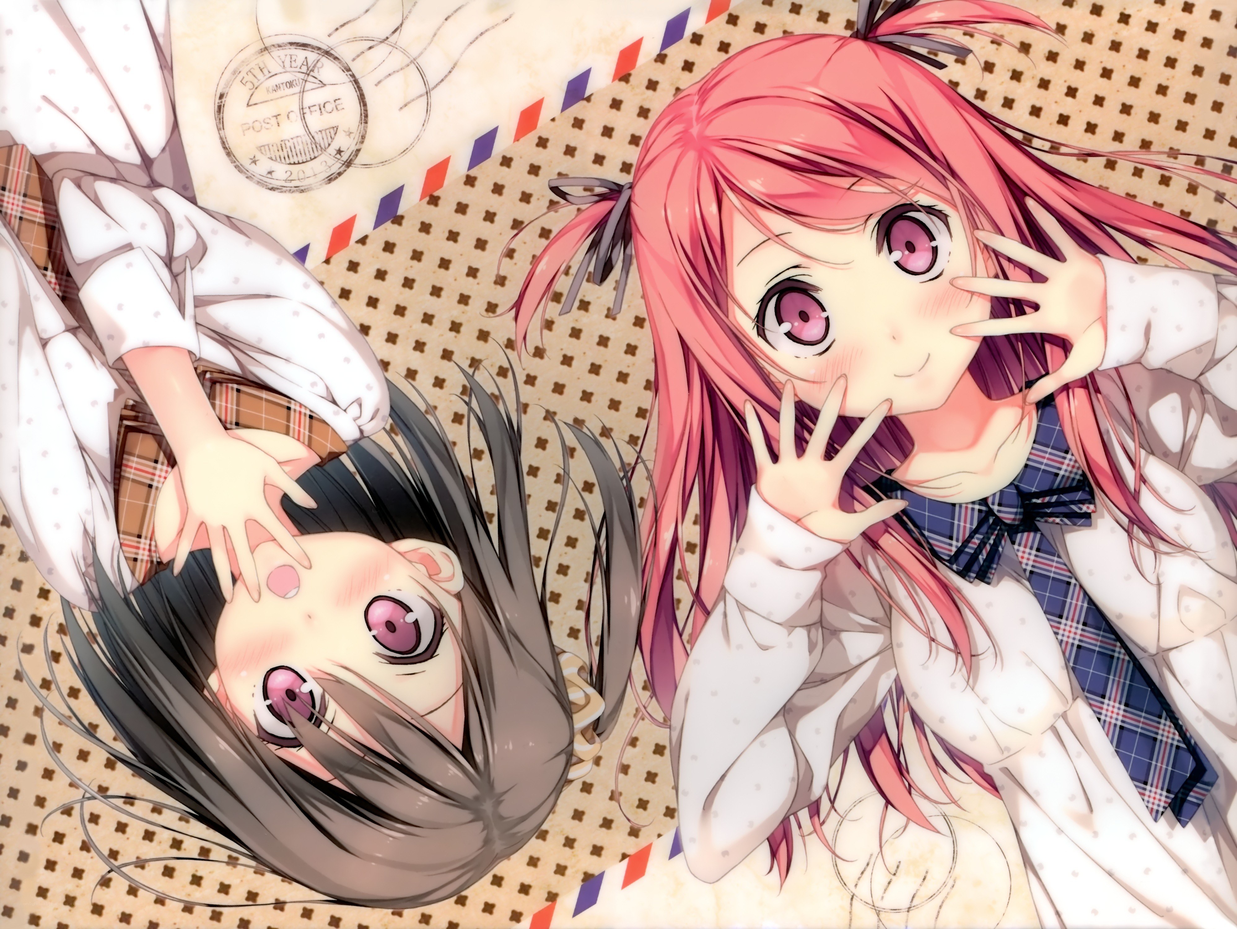 Two anime girls on a letter