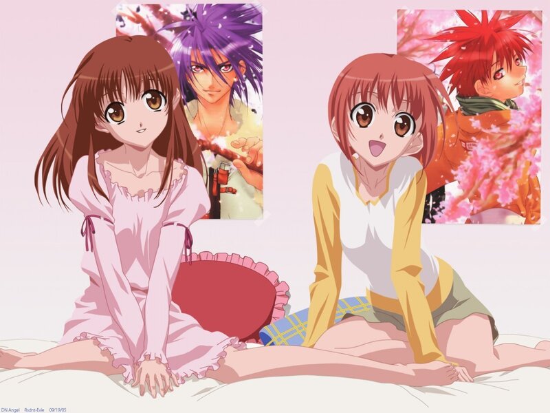 Two Anime Girls on Bed