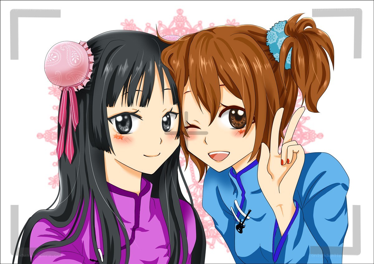 Two anime girls posing together