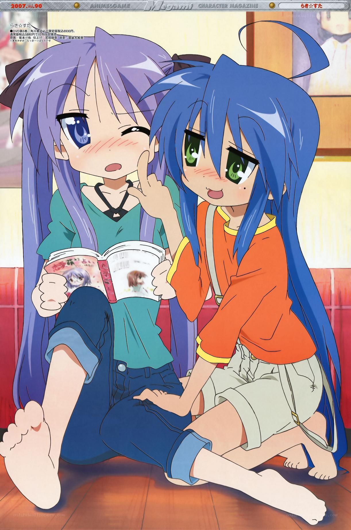 Two anime girls reading a book