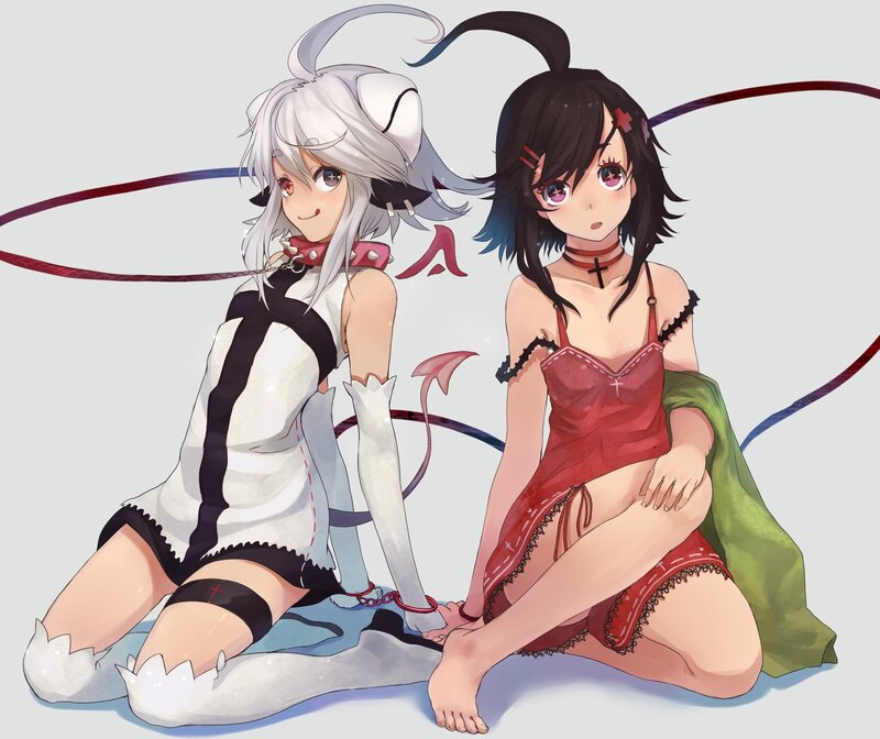 two anime girls sitting together