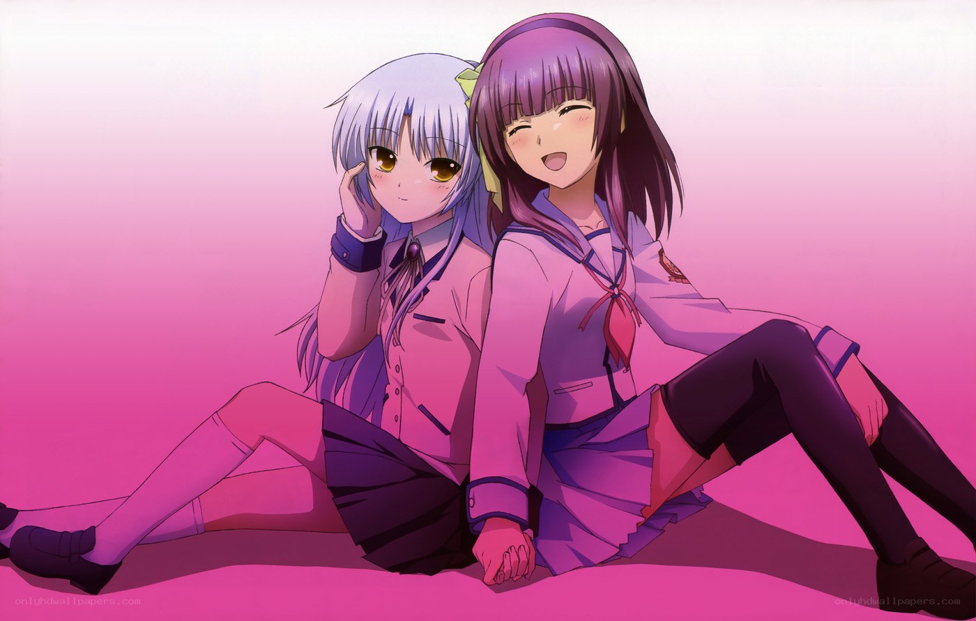 two anime girls sitting together