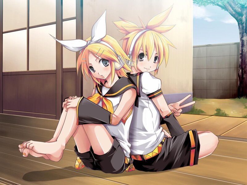 Two Anime Girls Sitting — Yellow, Playful