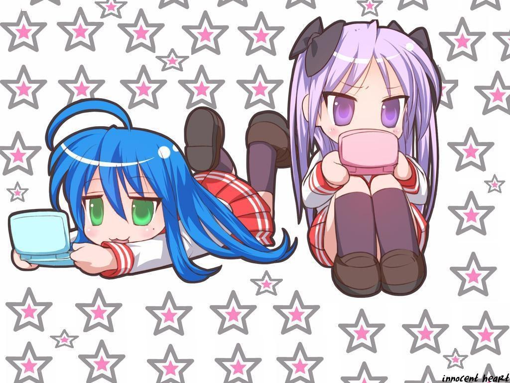 two anime girls with handheld consoles