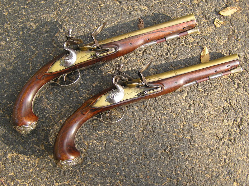 Two Antique Flintlock Pistols