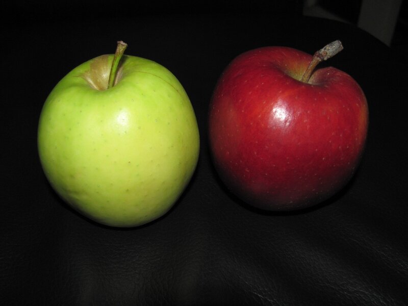 Two Apples on Black Surface — Red