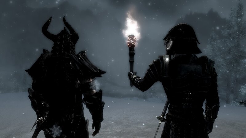 Two armored figures in snowy landscape