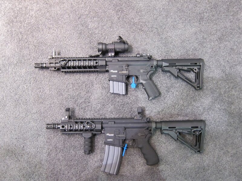 Two assault rifles on carpet