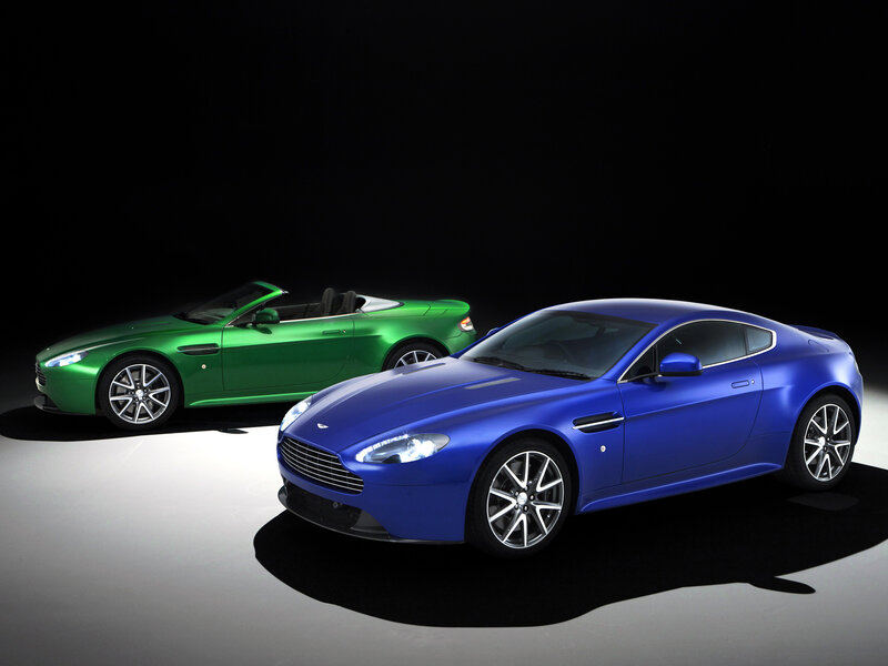 Two Aston Martin Cars — Blue