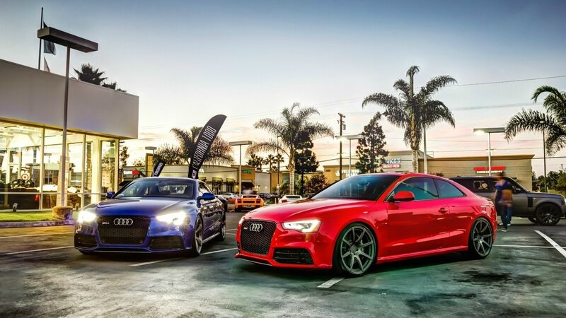Two Audi Cars in Parking Lot