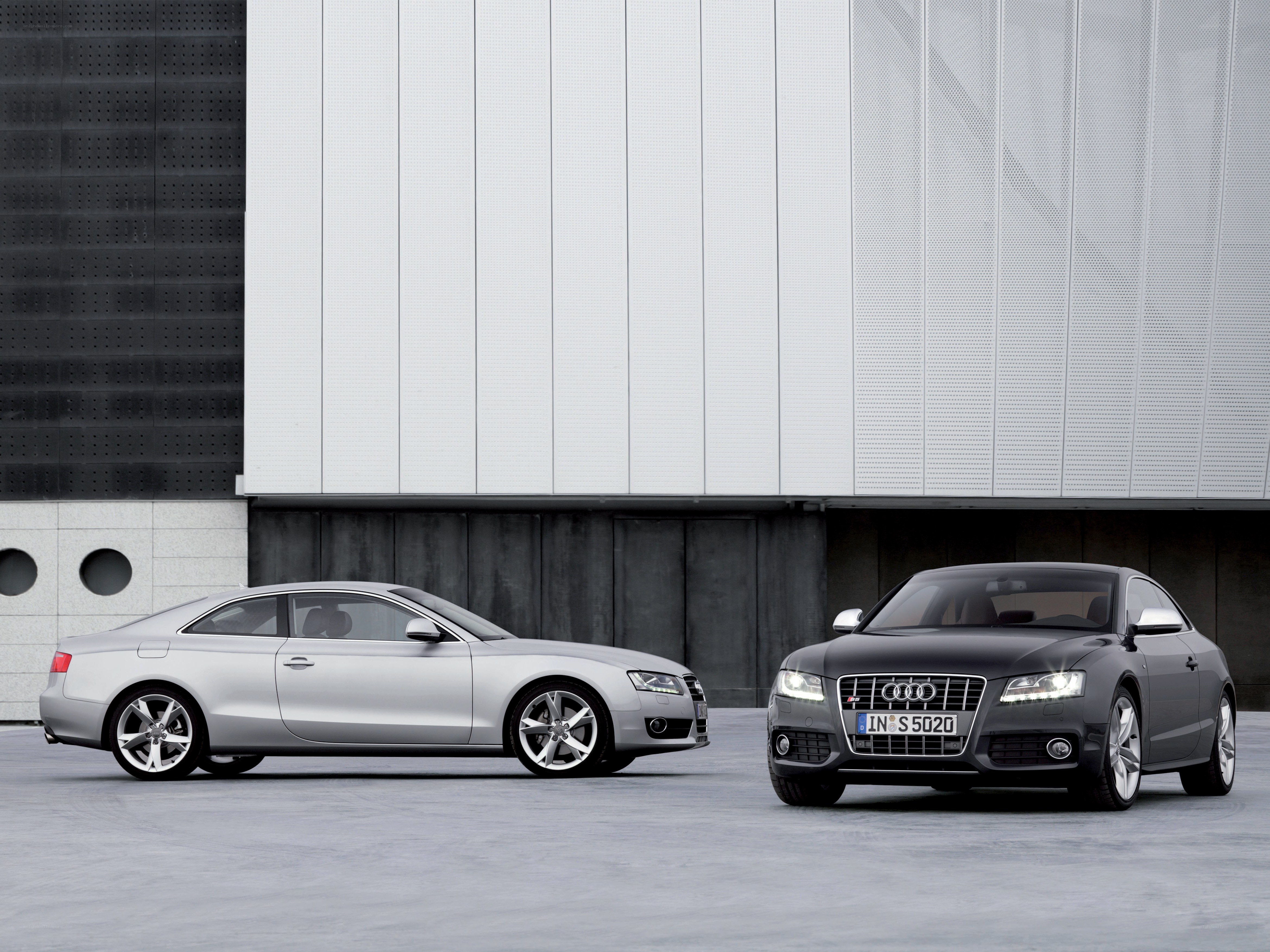 Two Audi cars on display