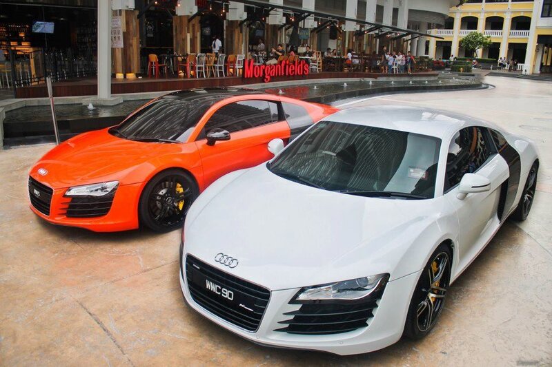 Two Audi R8 sports cars on display