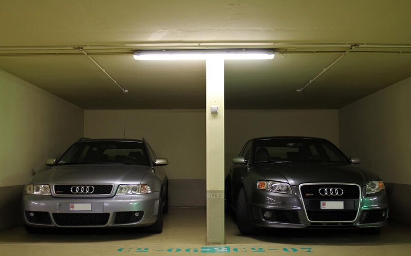 Two Audis in a garage