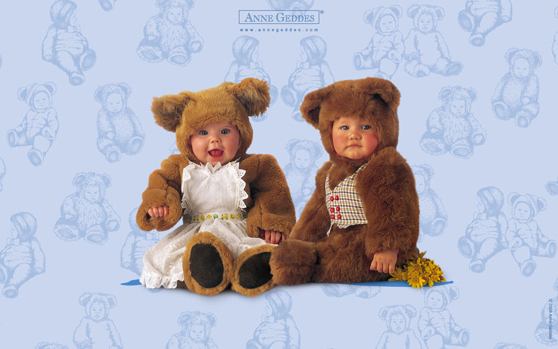 Two Babies in Bear Costumes