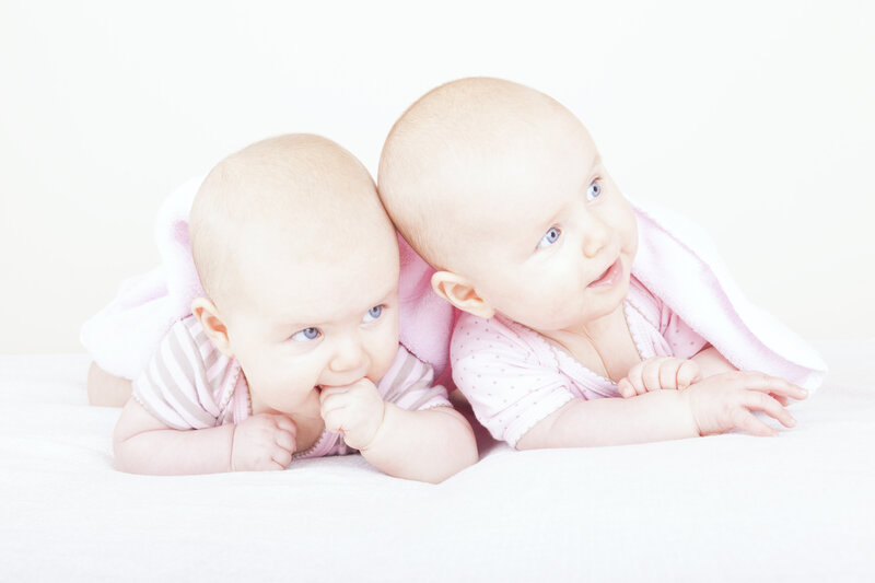 Two Babies Lying Down — White, Calm