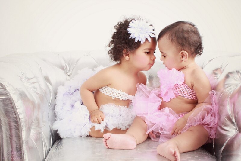 Two Babies on Couch — White
