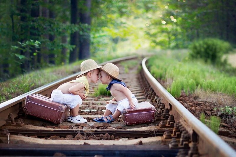 Two Babies on Train Tracks