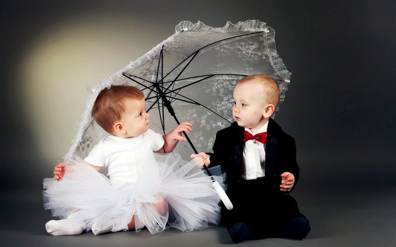 Two Babies under Umbrella
