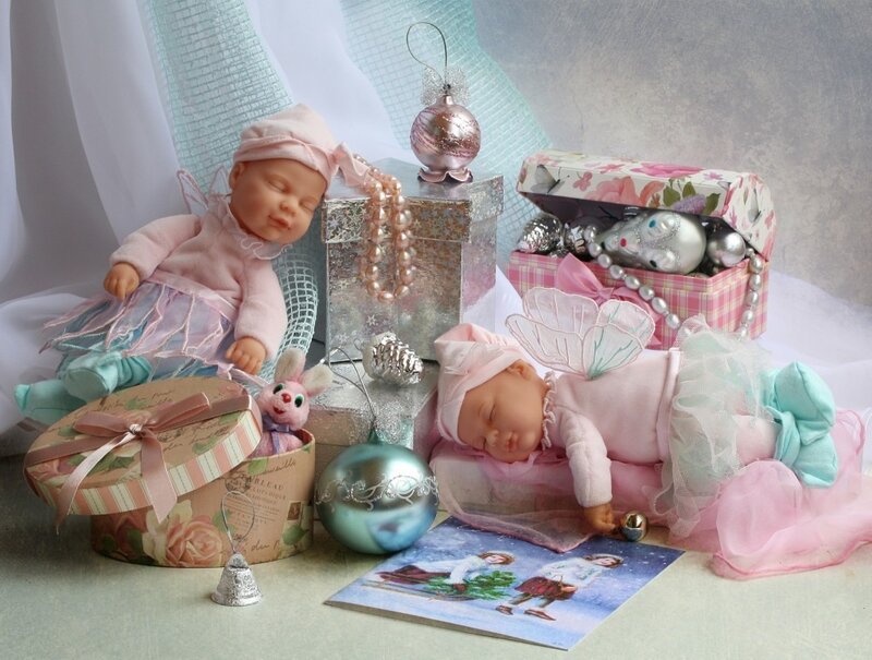 Two Baby Dolls with Ornaments