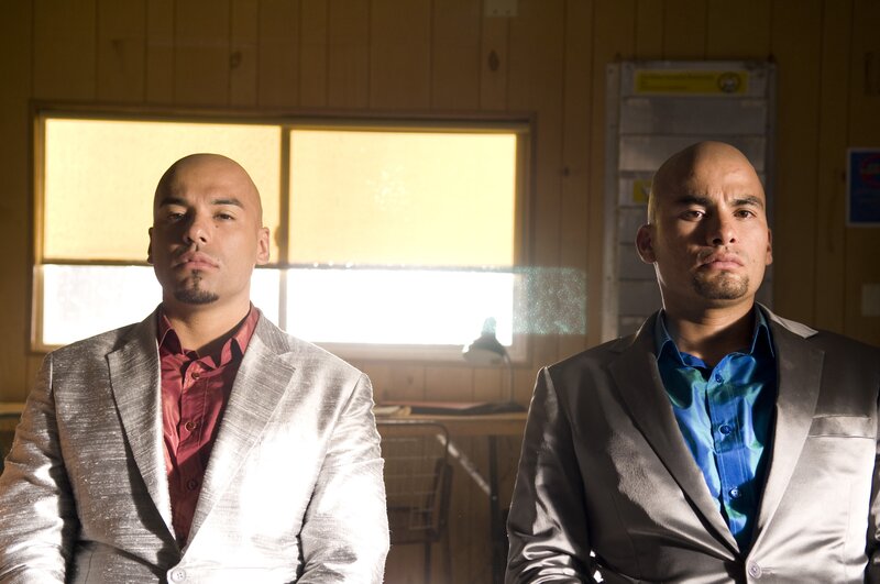 Two Bald Men in Suits